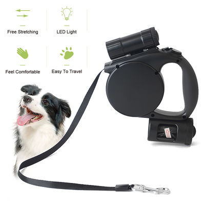 3 retractables automáticos en 1 correa de perro de la cuerda con los bolsos de la linterna y del impulso