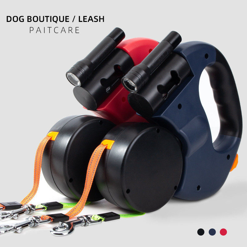 Correa elástico resistente de la correa de perro retractable dual reflexiva con los bolsos del impulso de la linterna de LED